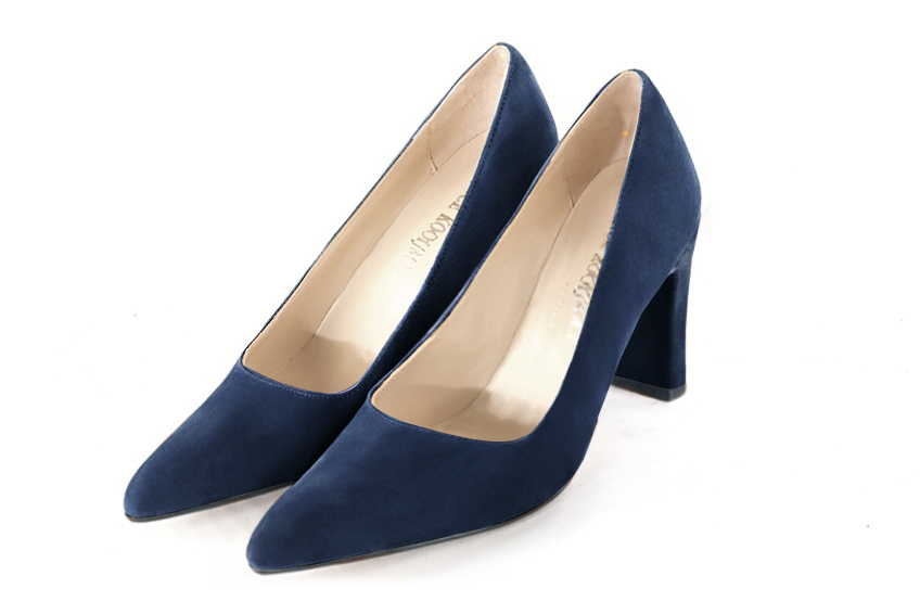 Navy blue dress pumps with a square neckline. Tapered toe. High comma heels